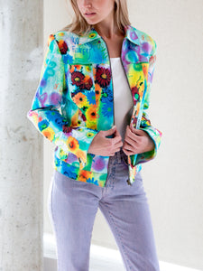 Woman wearing vintage graffiti print jacket