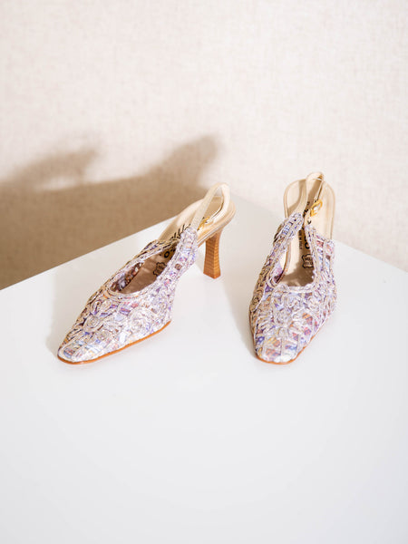 An unusual pair of vintage 1990s metallic leather and mesh passementerie slingback heels by Zodiaco.