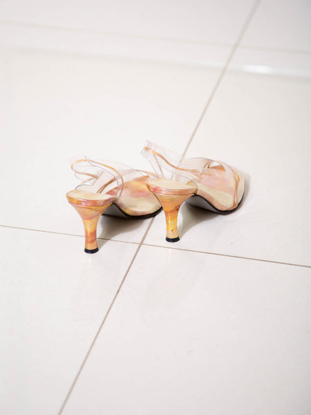 A pair of unusual vintage 1990s metallic leather and clean vinyl slingback heels by Azuree Cannes.