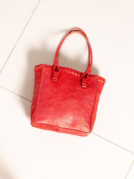 Designer vintage Bottega Veneta bag in metallic red leather.