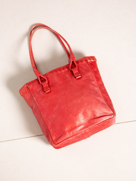 Designer vintage Bottega Veneta bag in metallic red leather.