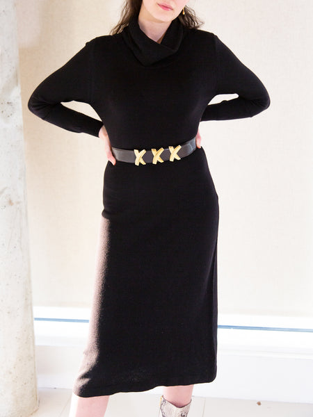 Dark brown leather belt with gold-tone 'X' embellishment by Paloma Picasso