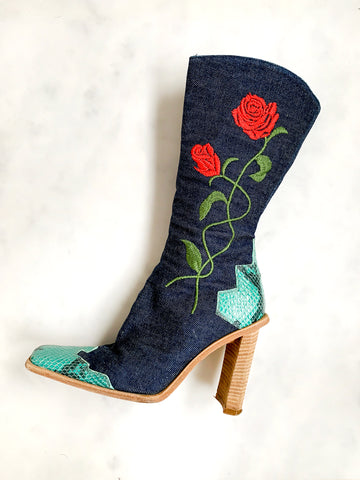 An incredible pair of rare vintage Y2K blue denim heeled cowboy boots. 