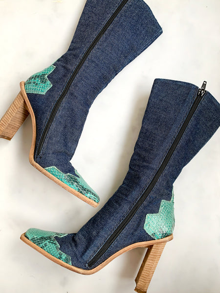 An incredible pair of rare vintage Y2K blue denim heeled cowboy boots. 