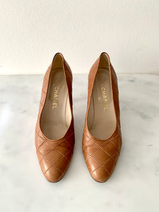 A pair of authentic vintage Chanel shoes in a classic quilted style from the 1980s/1990s.