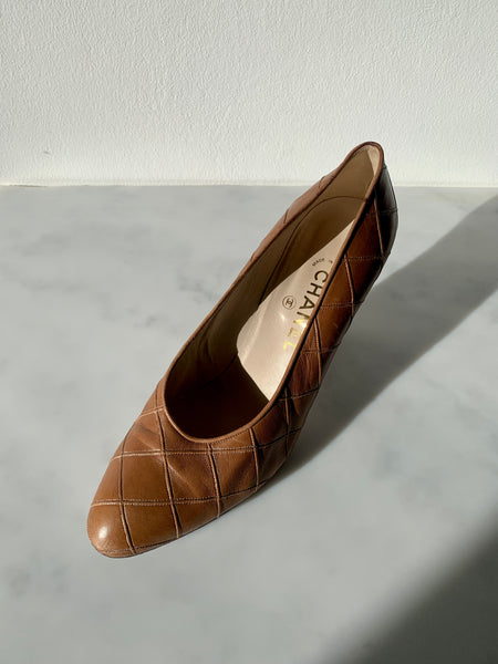 A pair of authentic vintage Chanel shoes in a classic quilted style from the 1980s/1990s.
