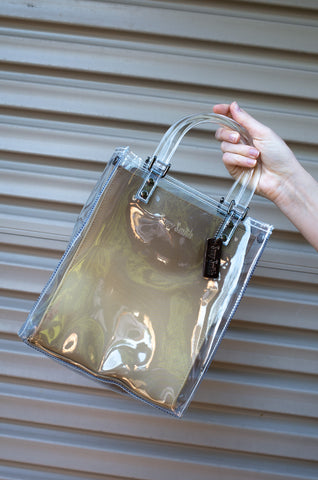 See-through Suzy Smith bag with gold ombre lining and lucite handles