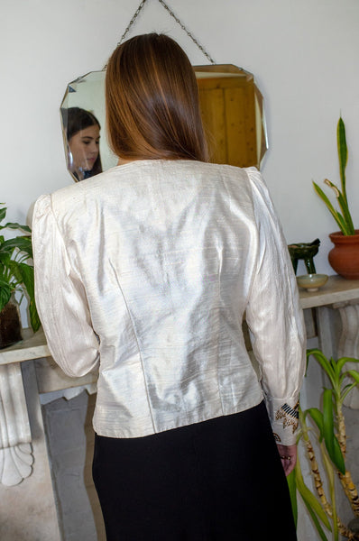 Model wears vintage ivory silk embellished beaded evening jacket