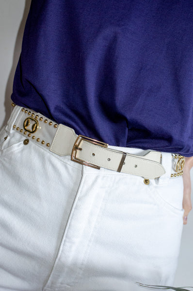 Vintage embellished vinyl and white leather waist belt.