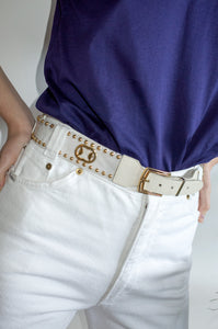 Vintage embellished vinyl and white leather waist belt.