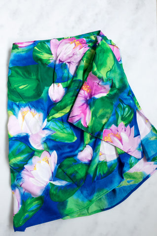 A vintage 1990s three-piece beachwear set with a Monet-inspired waterlily print.