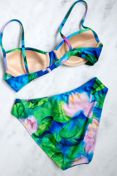 A vintage 1990s three-piece beachwear set with a Monet-inspired waterlily print.