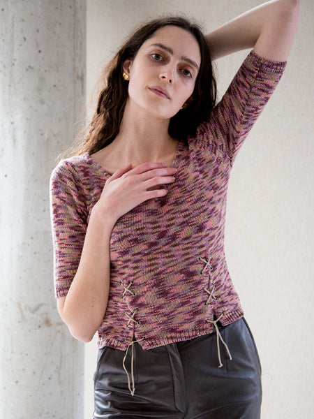 Model wearing Vintage gold-tone heart-shaped leaf earrings with a purple knitted top