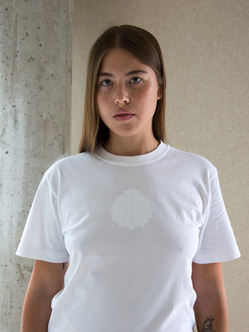 Woman wearing vintage 1980s/1990s white oversized T-shirt by Cerruti Club
