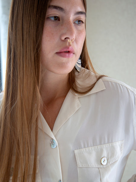 Vintage 1990s cream long-sleeve pocket blouse with real shell buttons